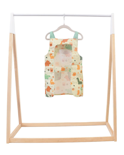 Lil' Foodee Dino Munch classic apron with teal dinosaur design and magnetic closures.