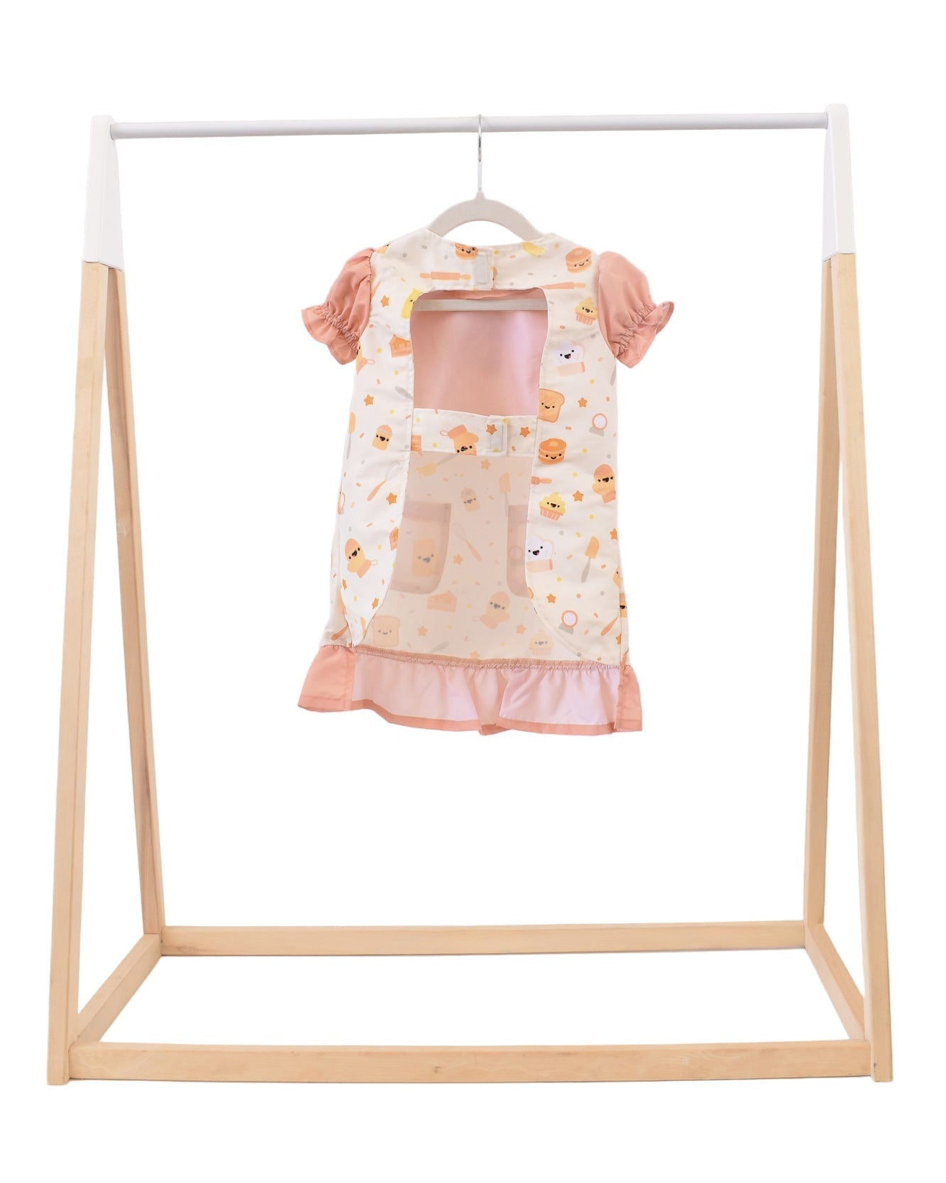 Lil' Foodee Lil Baker puff-sleeve apron in pastel baking print with cupcakes, whisks and sprinkles.