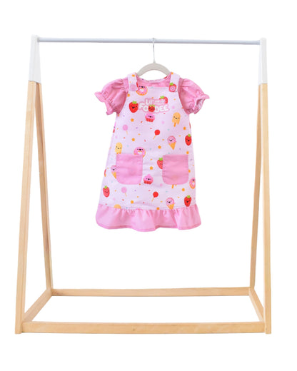Lil' Foodee Strawberry Sprinkles puff-sleeve apron with pink strawberry print and full-coverage puff sleeves.